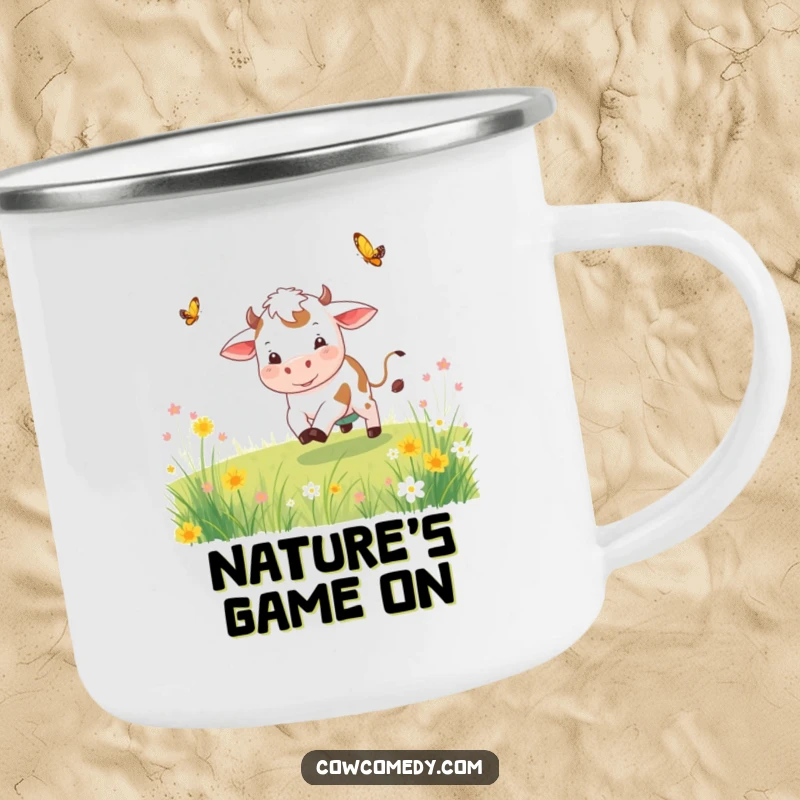 Funny playful cow enamel camping mug with a cow chasing a butterfly, durable and perfect for outdoor escapades.