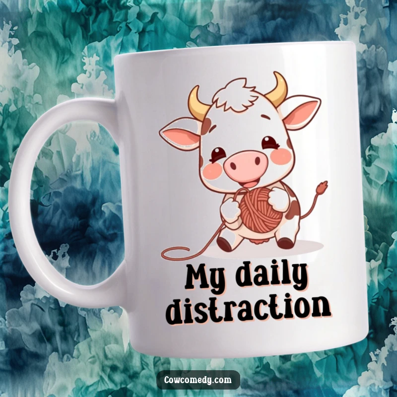 Funny mug illustration of a very happy and excited cow enthusiastically bouncing a colorful ball of yarn with its nose, showing pure delight.