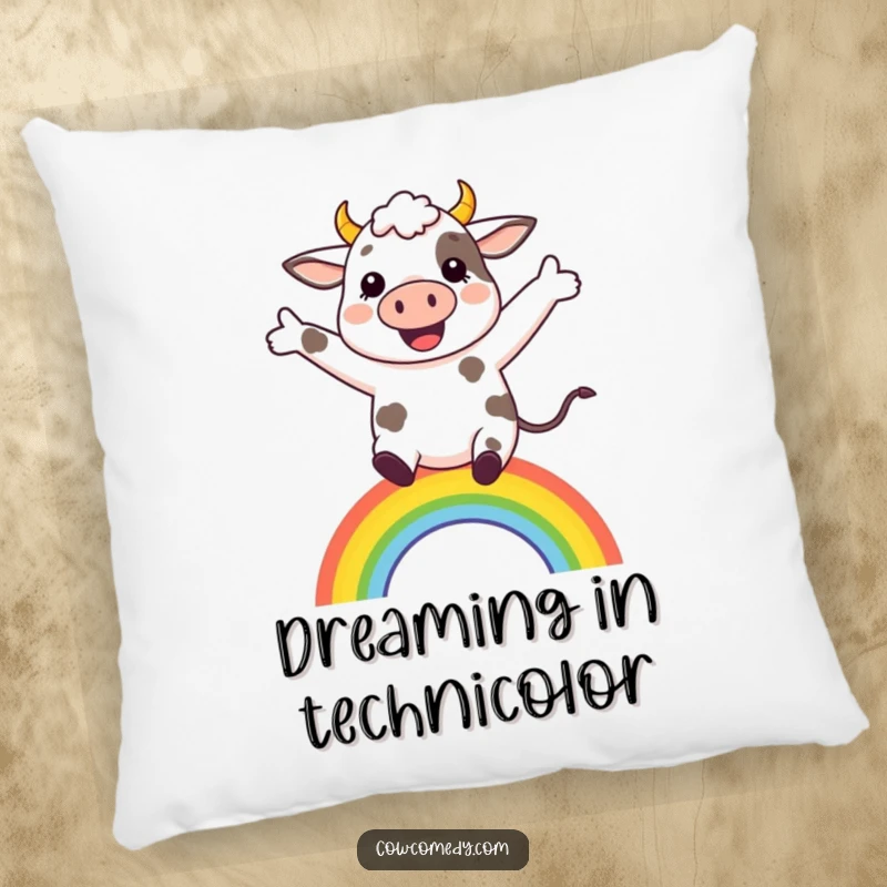 Funny happy cow leaping over a colorful rainbow on a soft, decorative pillow for any cheerful home.