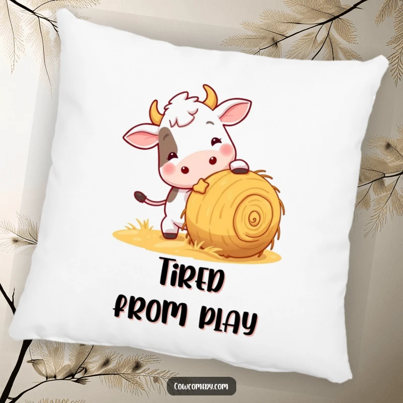 Funny decorative pillow with a playful cow nudging a rolling ball of hay, providing comfort and a humorous, energetic vibe.