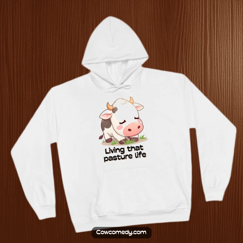 Funny Hoodie featuring a blissfully contented cow with eyes closed, peacefully grazing, offering warmth and humorous relaxation.