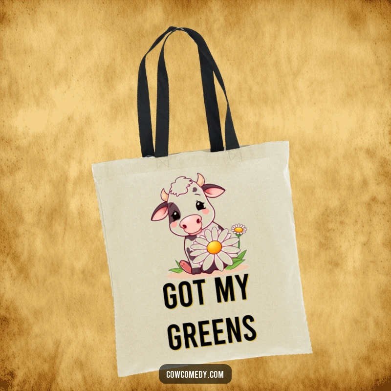 Funny tote bag depicting a cheerful cow happily eating a huge, stylized daisy. Practical and humorous accessory for everyday use.