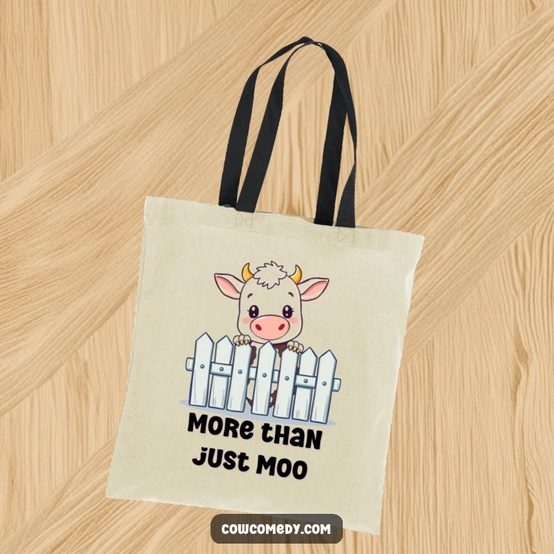 Funny tote bag featuring a curious cow peeking over a picket fence, stylish and functional for daily use.